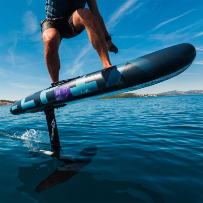 Rider flying above the water on the new Jobe Epix inflatable e-foil
