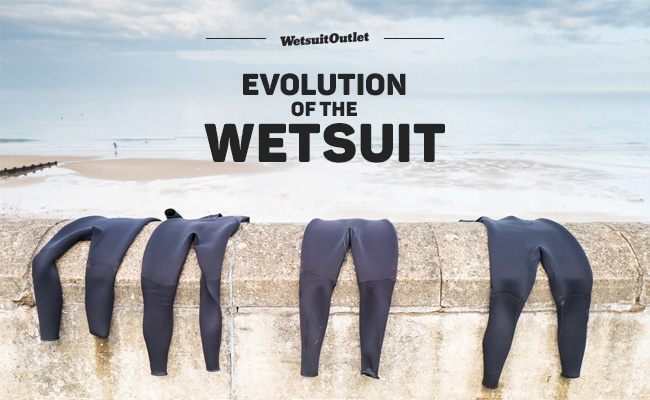 Mute in neoprene appese a un muretto in riva al mare